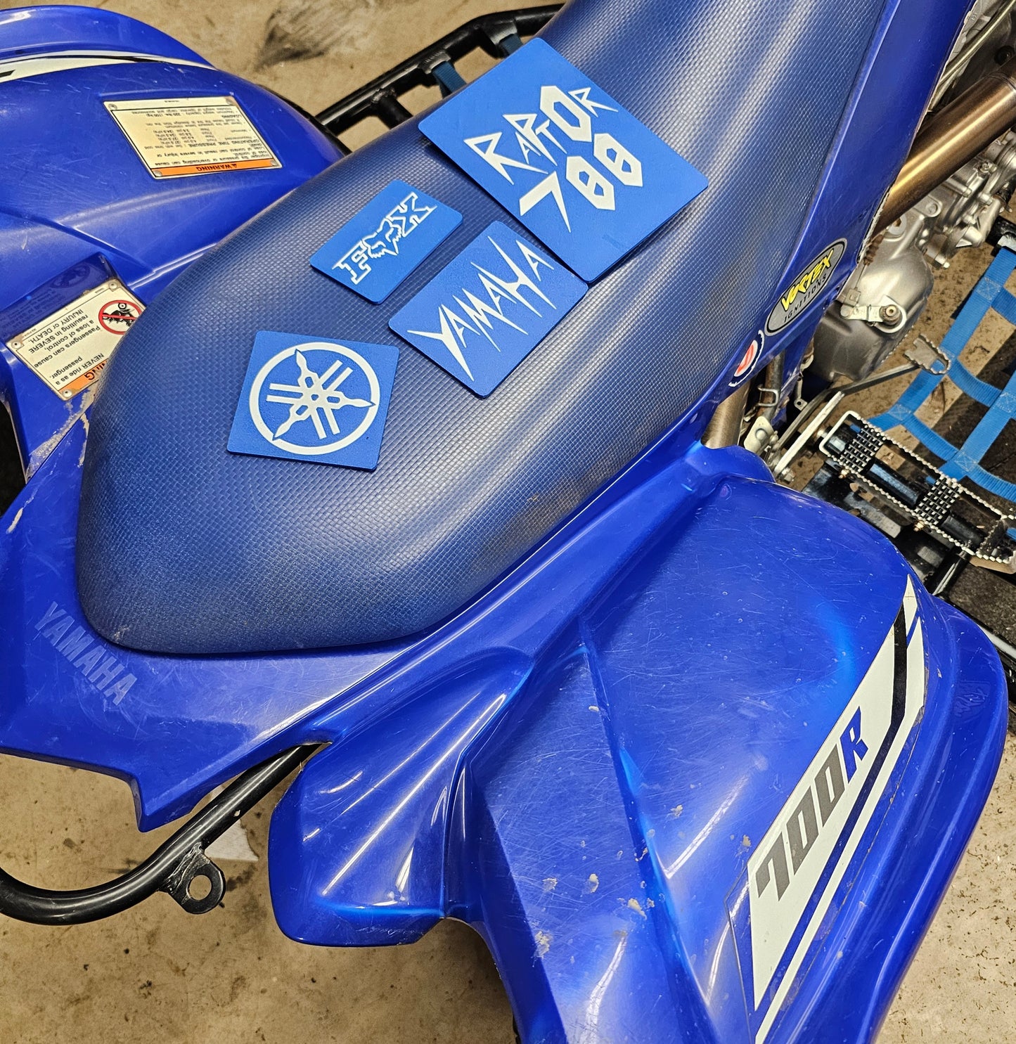 Warning label replacement plates