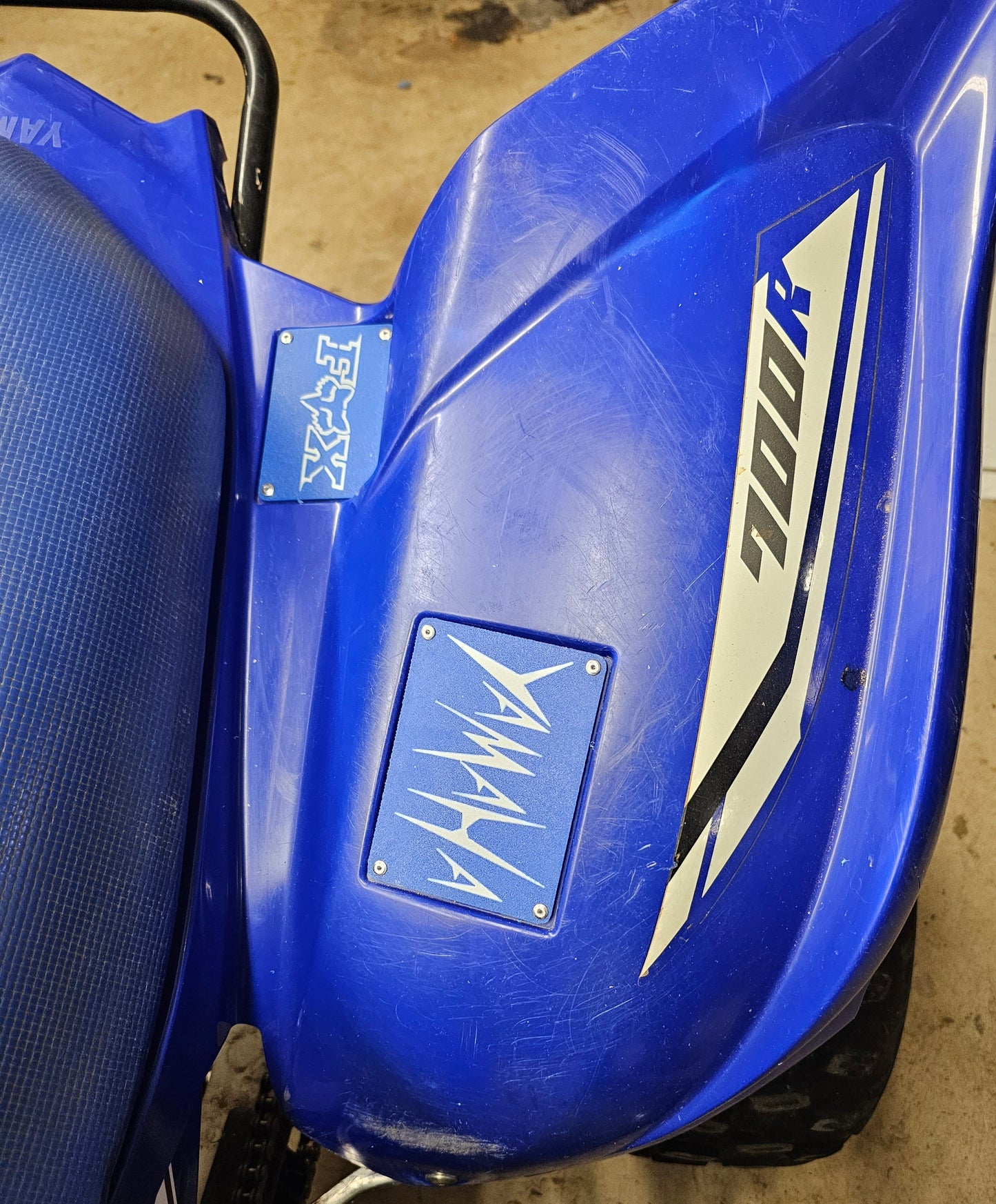 Warning label replacement plates